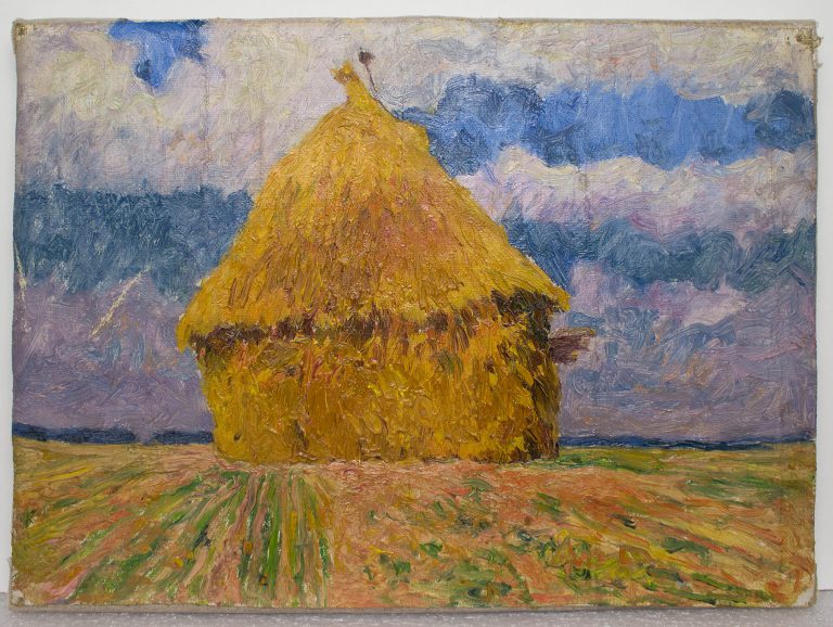 Eine Dieme, Haufen von Getreide, auf einem Feld.