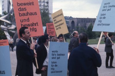 People with signs in their hands.