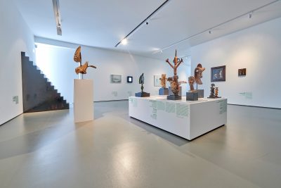 Exhibition view "Why Art?" with ethnological objects